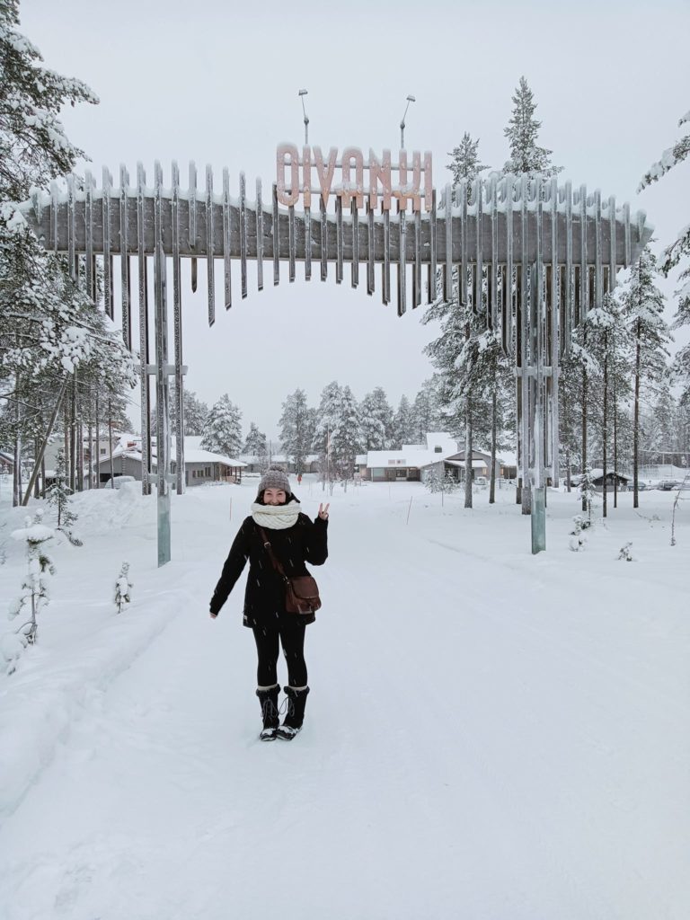 Girl standing in front of Oivanki Youth Centre